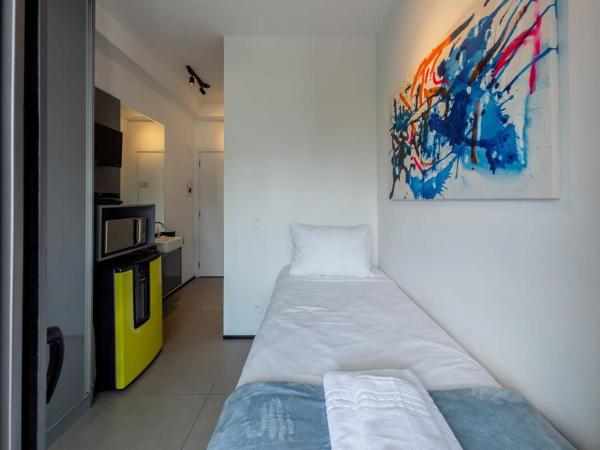 BHomy Paulista - Suite a 6min do metro Paraiso VER412 : photo 2 de la chambre suite