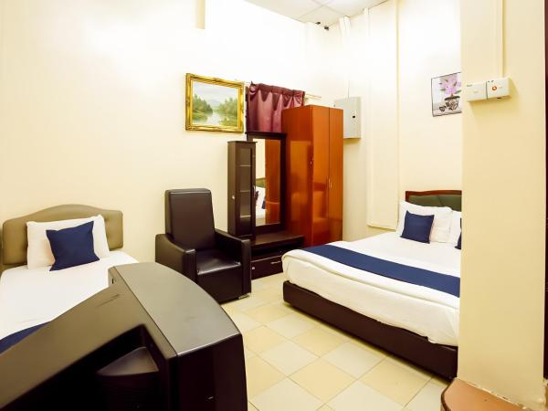 New Casavilla Travellers Lodge Pudu : photo 5 de la chambre chambre triple standard