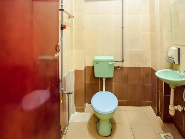 New Casavilla Travellers Lodge Pudu : photo 1 de la chambre chambre familiale