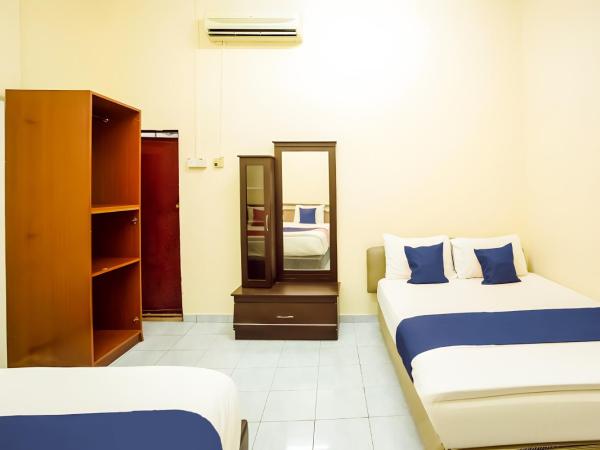 New Casavilla Travellers Lodge Pudu : photo 3 de la chambre chambre familiale