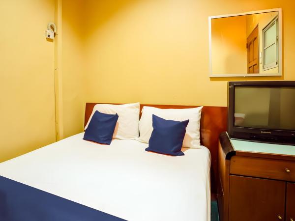 New Casavilla Travellers Lodge Pudu : photo 1 de la chambre chambre double standard avec salle de bains commune