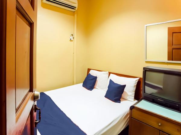 New Casavilla Travellers Lodge Pudu : photo 2 de la chambre chambre double standard avec salle de bains commune