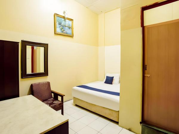 New Casavilla Travellers Lodge Pudu : photo 1 de la chambre petite chambre double
