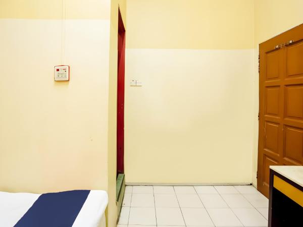 New Casavilla Travellers Lodge Pudu : photo 7 de la chambre petite chambre double