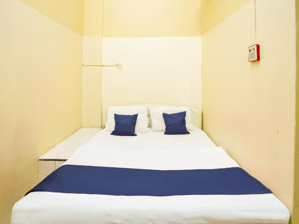 New Casavilla Travellers Lodge Pudu : photo 2 de la chambre petite chambre double