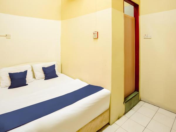 New Casavilla Travellers Lodge Pudu : photo 6 de la chambre petite chambre double