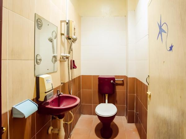 New Casavilla Travellers Lodge Pudu : photo 3 de la chambre chambre lits jumeaux