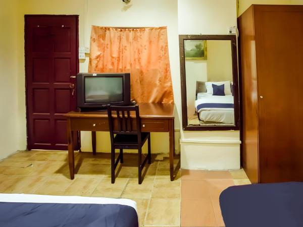 New Casavilla Travellers Lodge Pudu : photo 4 de la chambre chambre lits jumeaux