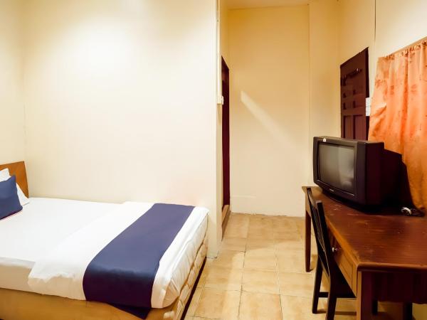 New Casavilla Travellers Lodge Pudu : photo 5 de la chambre chambre lits jumeaux