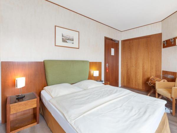 Hotel Delfino Lugano : photo 7 de la chambre chambre lit queen-size Élégante