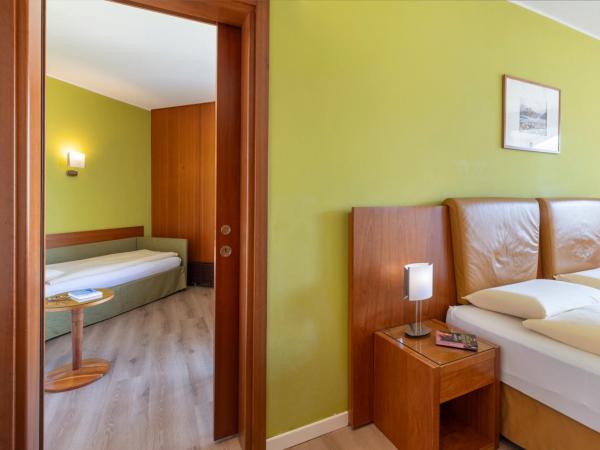 Hotel Delfino Lugano : photo 5 de la chambre suite junior avec vue partielle sur le lac