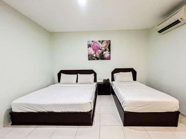 Ho Hotel : photo 1 de la chambre chambre triple supérieure