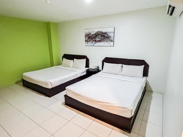 Ho Hotel : photo 2 de la chambre chambre deluxe avec 2 lits queen-size