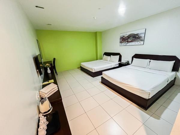 Ho Hotel : photo 1 de la chambre chambre deluxe avec 2 lits queen-size