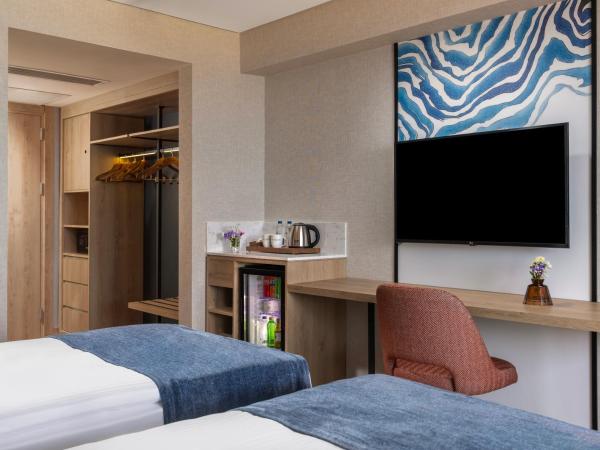 Elite World Kuşadası : photo 1 de la chambre chambre supérieure avec 2 lits simples