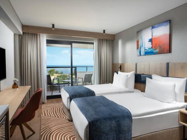 Elite World Kuşadası : photo 1 de la chambre chambre supérieure avec 2 lits simples - vue sur mer