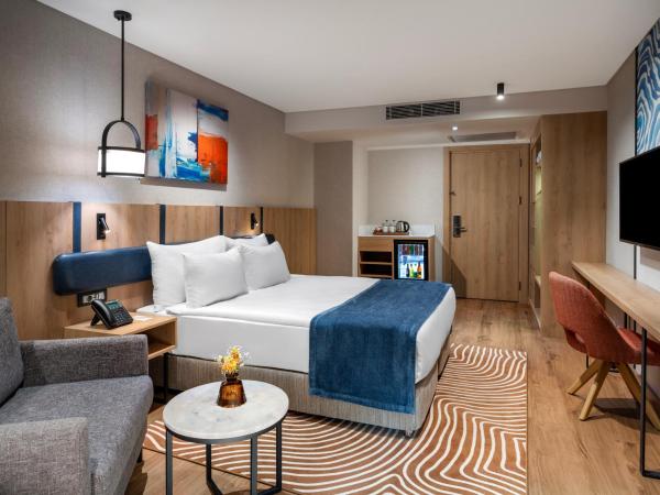 Elite World Kuşadası : photo 3 de la chambre suite avec lit queen-size