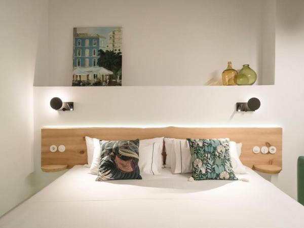 La Moderna Suites : photo 8 de la chambre suite - vue sur jardin