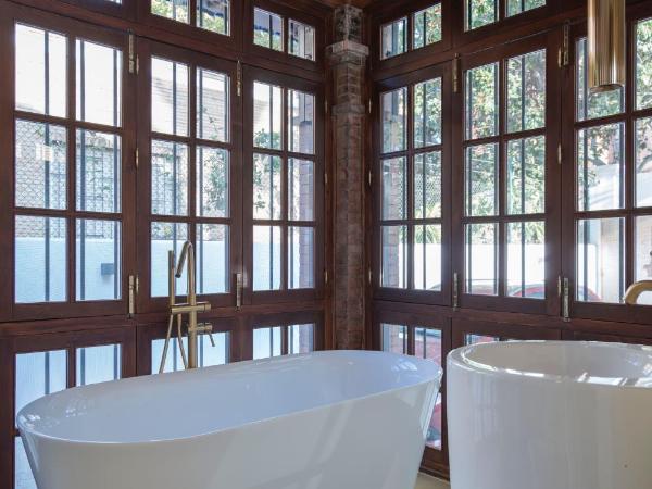 La Moderna Suites : photo 1 de la chambre suite lit king-size - vue sur piscine