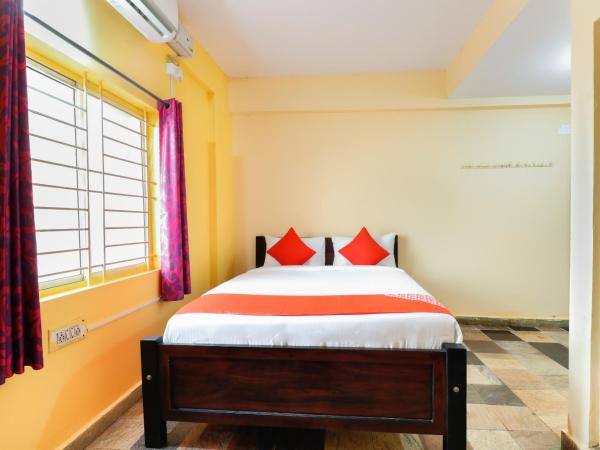 OYO 65533 Elite Suites : photo 10 de la chambre chambre triple classique