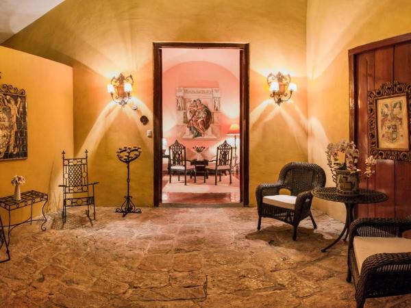 Hacienda Santa Cruz Merida : photo 2 de la chambre suite supérieure lit king-size