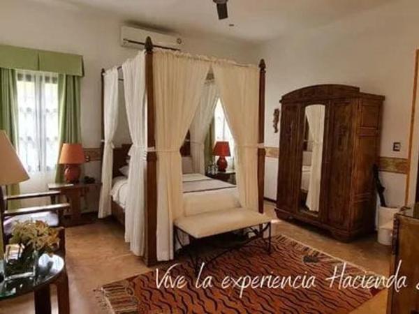 Hacienda Santa Cruz Merida : photo 1 de la chambre chambre deluxe