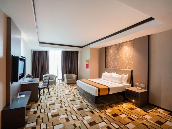 Grand Paragon Hotel Johor Bahru : photo 1 de la chambre chambre lit king-size deluxe