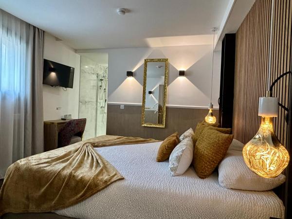 Le Confidentiel Hôtel & SPA : photo 2 de la chambre suite avec jacuzzi