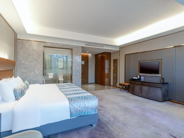 GuangZhou TongYu International Hotel : photo 1 de la chambre chambre exécutive lit queen-size