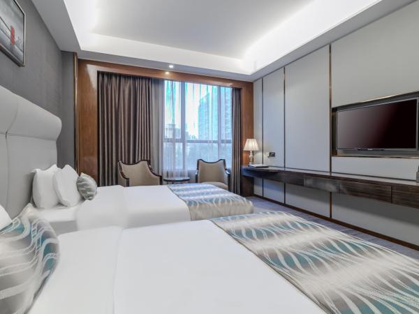 GuangZhou TongYu International Hotel : photo 4 de la chambre chambre lits jumeaux exécutive