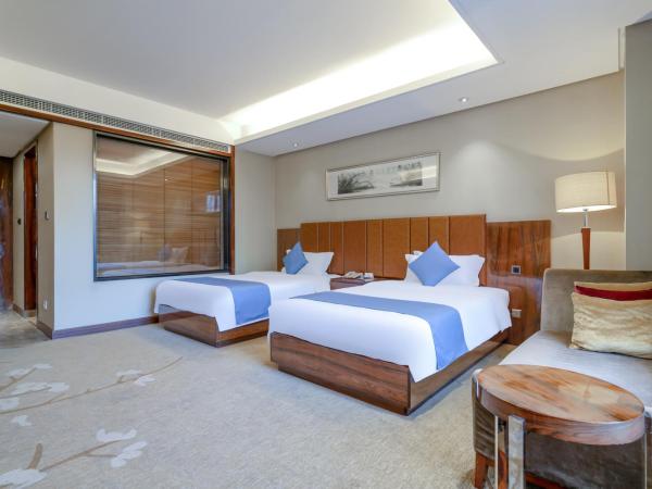 GuangZhou TongYu International Hotel : photo 4 de la chambre chambre lits jumeaux deluxe