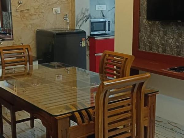 Treebo Love Shore Residency, Near Lakeshore Hospital : photo 9 de la chambre chambre double supérieure