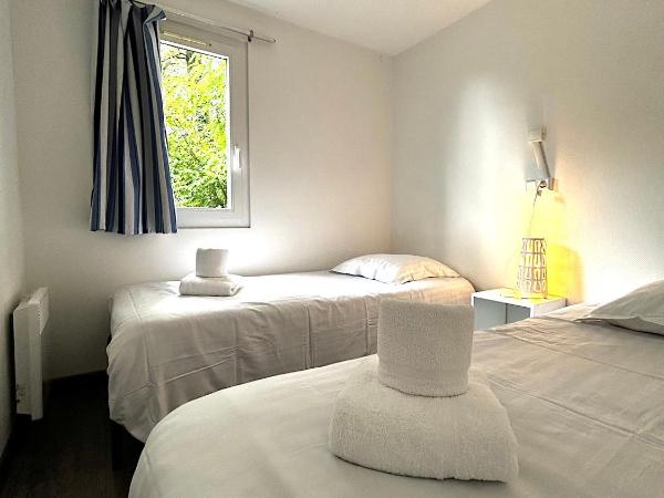 Les Chalets du Périgord : photo 1 de la chambre chambre familiale