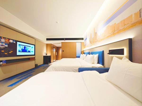 Hampton by Hilton Guangzhou Railway Station : photo 2 de la chambre chambre triple deluxe