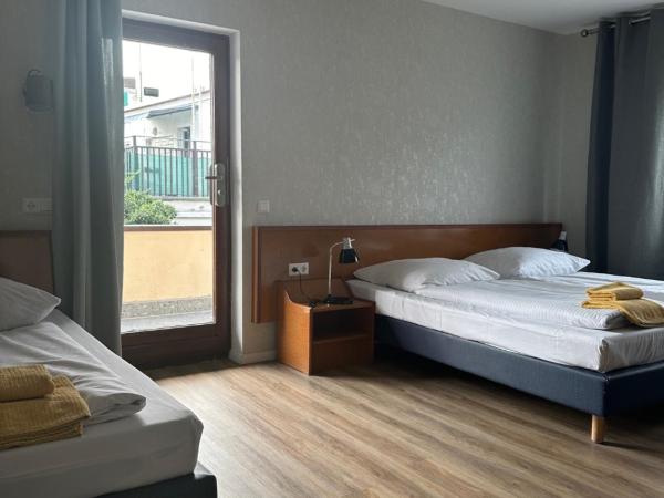 Hotel Pirol : photo 5 de la chambre chambre triple avec terrasse