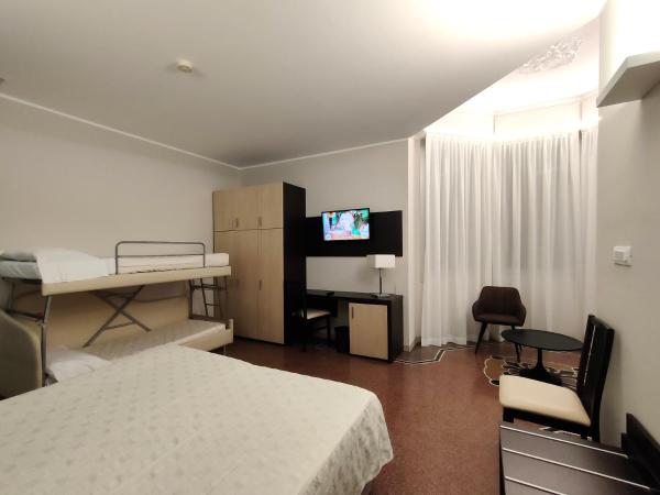 Hotel Vittoria : photo 1 de la chambre chambre quadruple