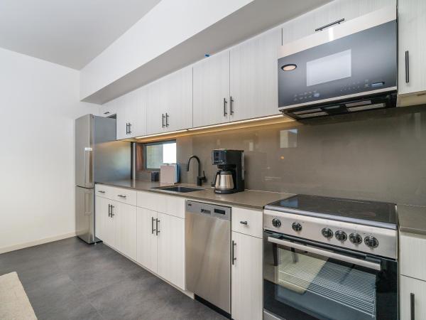 City24 Condo Hotel Little Italy Mission Hills : photo 6 de la chambre appartement 1 chambre de luxe - vue sur jardin