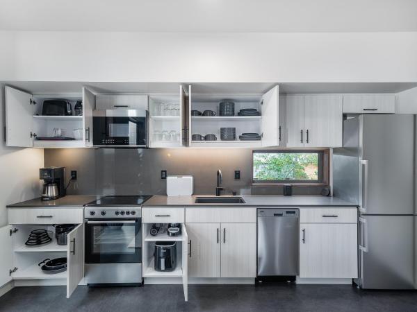 City24 Condo Hotel Little Italy Mission Hills : photo 8 de la chambre appartement 1 chambre de luxe - vue sur jardin