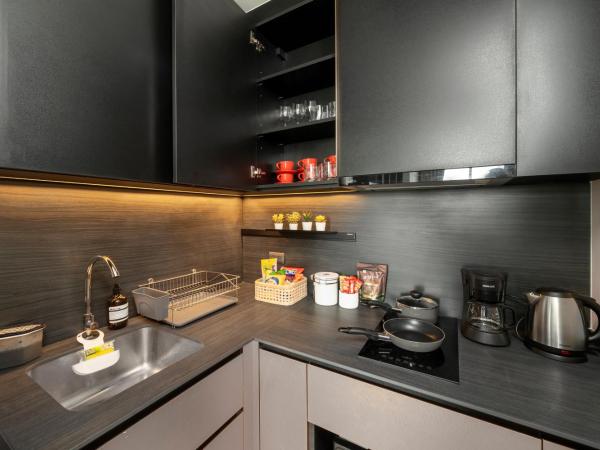 Vacaystation Edge Central Pattaya : photo 5 de la chambre chambre familiale - vue sur mer