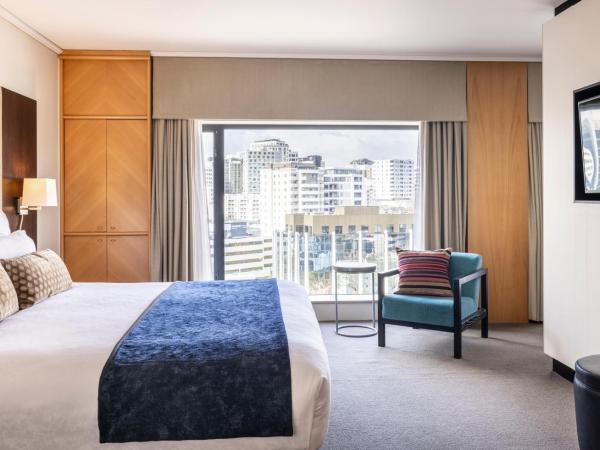 Grand Millennium Auckland : photo 2 de la chambre suite junior lit king-size avec accès au club
