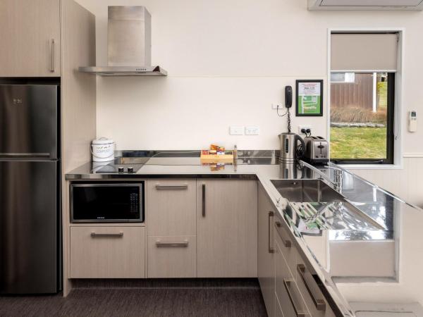 Wanaka Top 10 Holiday Park : photo 8 de la chambre studio familial