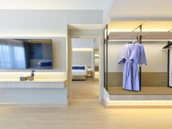 Centre Point Pratunam : photo 2 de la chambre chambre familiale communicante