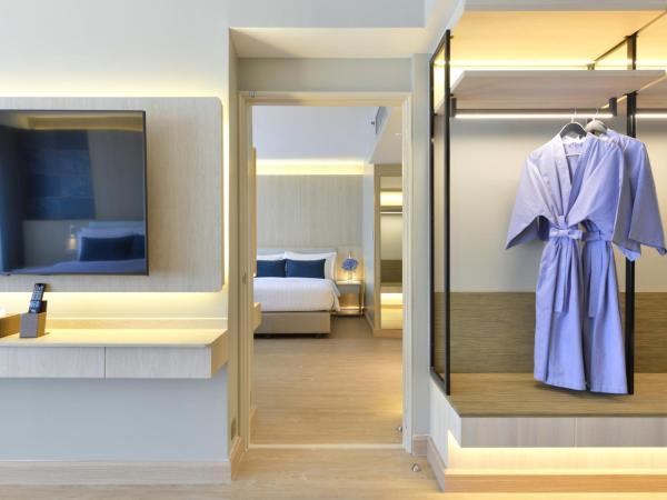 Centre Point Pratunam : photo 1 de la chambre chambre familiale communicante