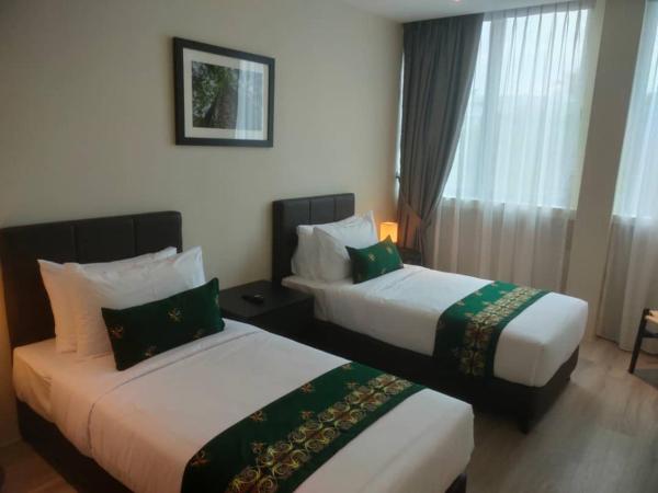 Telang Usan Hotel Kuching : photo 2 de la chambre chambre lits jumeaux deluxe
