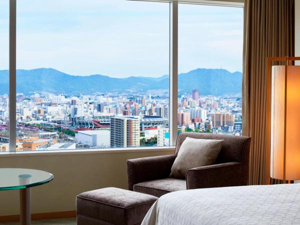 Sheraton Grand Hiroshima Hotel : photo 6 de la chambre chambre deluxe avec 2 lits doubles - vue sur ville