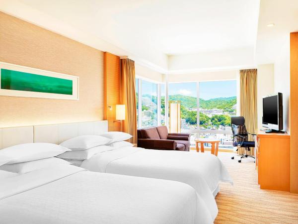 Sheraton Grand Hiroshima Hotel : photo 3 de la chambre chambre d’angle deluxe avec 2 lits doubles - vue sur ville