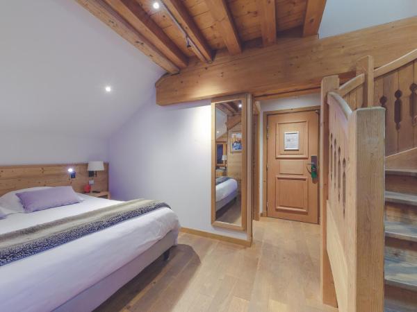Fleur De Neige Châtel : photo 2 de la chambre chambre exclusive en duplex