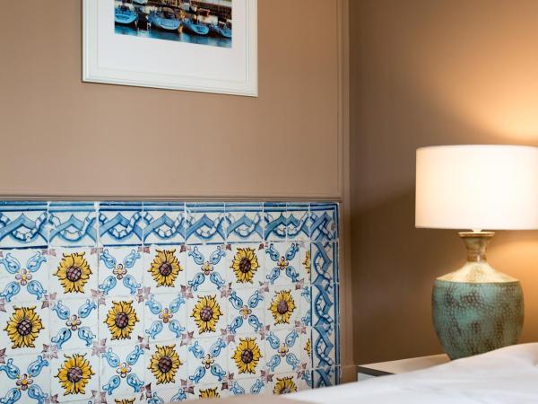 PH Downtown Suites : photo 3 de la chambre suite avec balcon