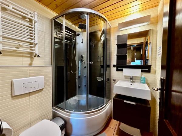 Domki Wczasowe Papaya : photo 9 de la chambre bungalow familial