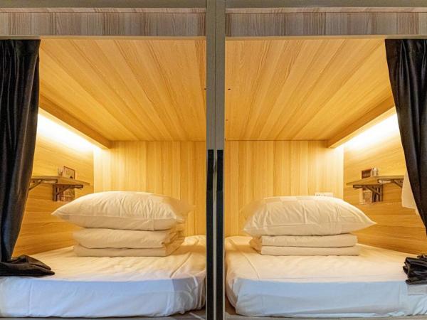 Chongqing Desti Youth Park Hostel People's Liberation Monument : photo 3 de la chambre bed in 6-beds female dormitory room